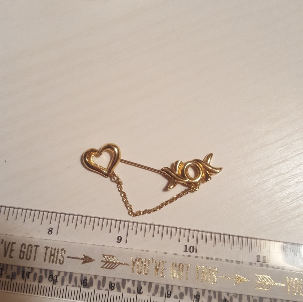 XOXO stick pin.